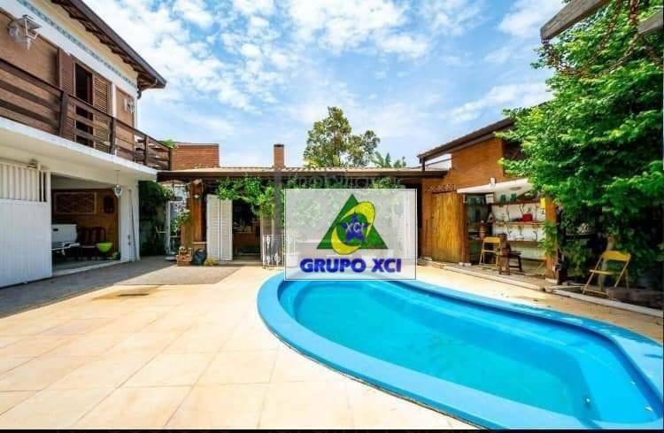 Casa à venda com 6 quartos, 287m² - Foto 7
