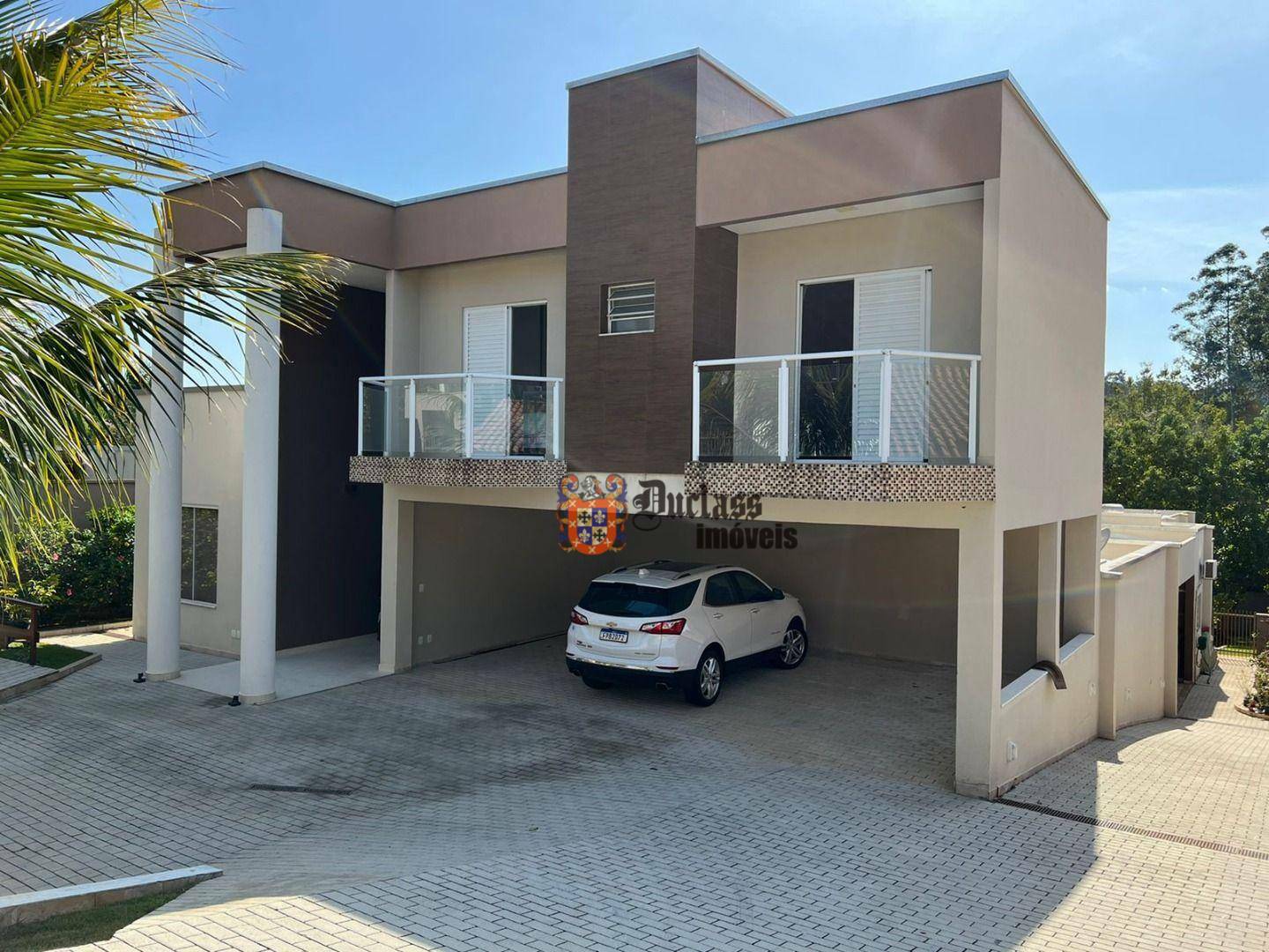 Casa de Condomínio à venda com 4 quartos, 560m² - Foto 1