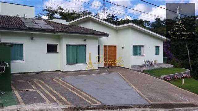 Casa de Condomínio à venda com 4 quartos, 400m² - Foto 1