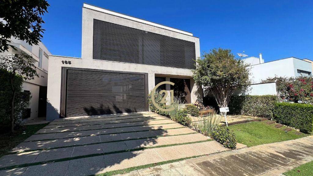 Casa de Condomínio à venda e aluguel com 4 quartos, 376m² - Foto 1