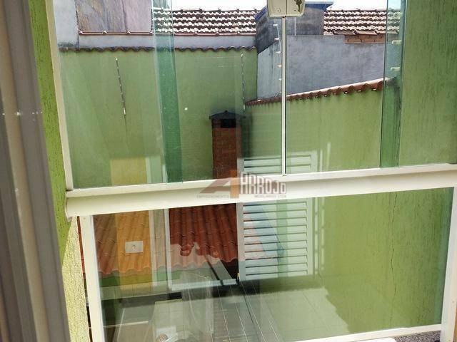 Sobrado à venda com 4 quartos, 200m² - Foto 32