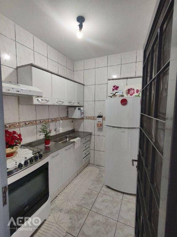 Casa à venda com 3 quartos, 124m² - Foto 7