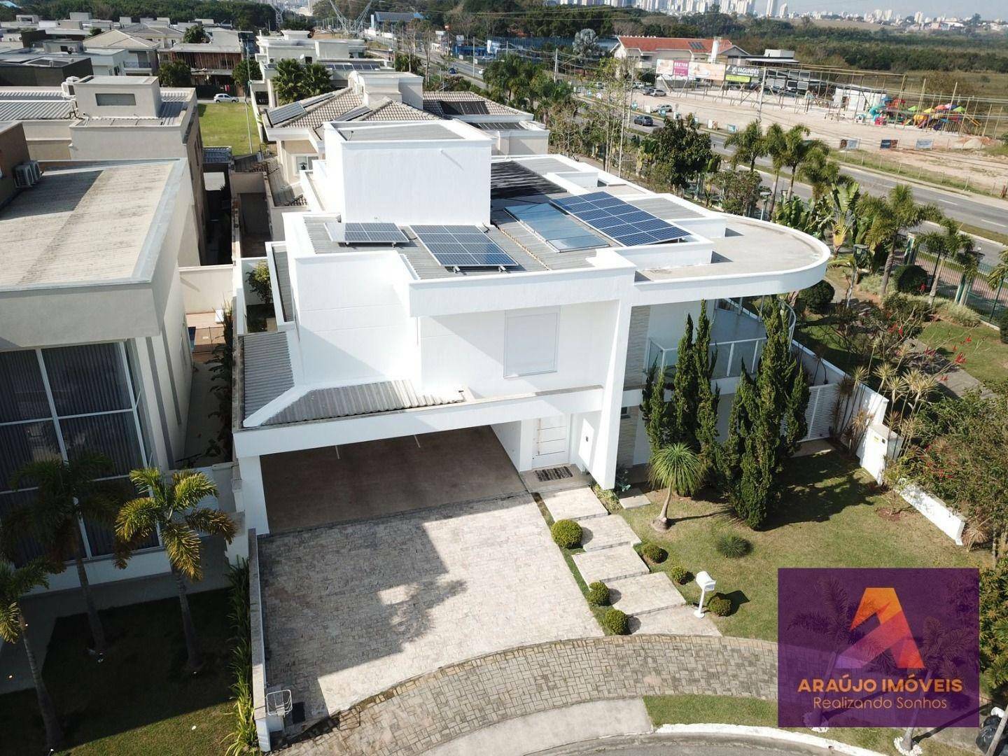 Casa de Condomínio à venda e aluguel com 4 quartos, 415m² - Foto 1