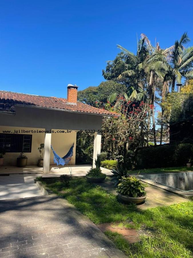 Casa à venda com 3 quartos, 333m² - Foto 1