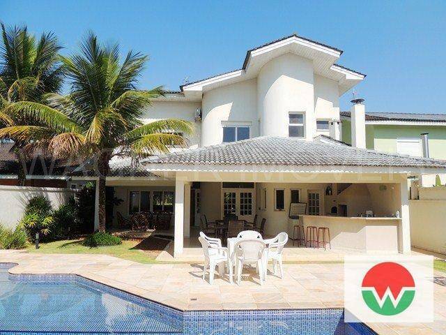 Casa de Condomínio à venda e aluguel com 4 quartos, 400m² - Foto 1