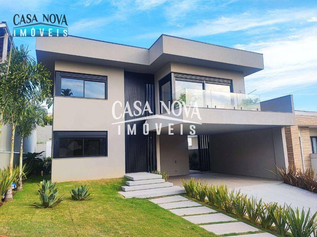 Casa de Condomínio à venda com 4 quartos, 397m² - Foto 1