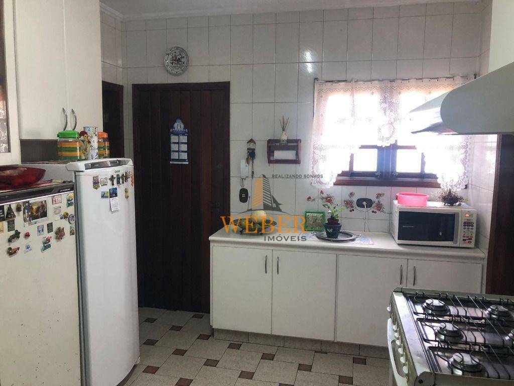 Casa à venda com 4 quartos, 286m² - Foto 6