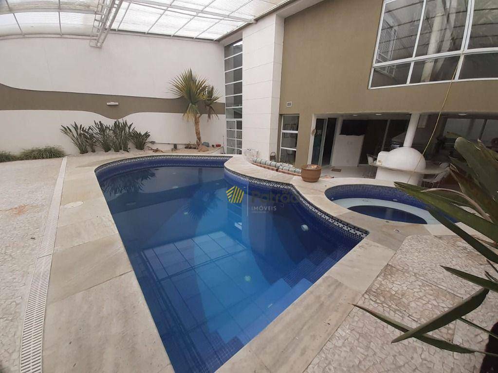 Casa de Condomínio à venda com 4 quartos, 600m² - Foto 1