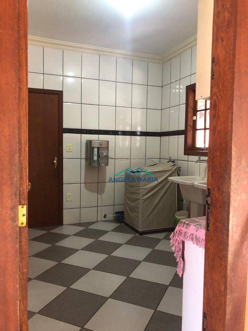 Casa à venda com 3 quartos, 328m² - Foto 5