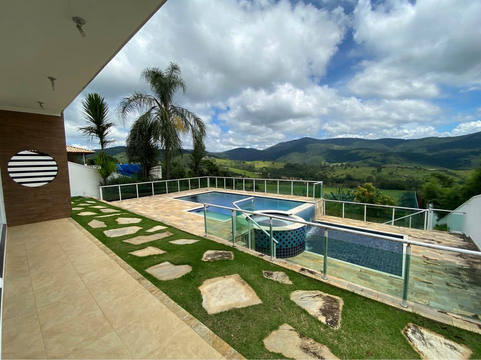 Casa de Condomínio à venda com 4 quartos, 450m² - Foto 1
