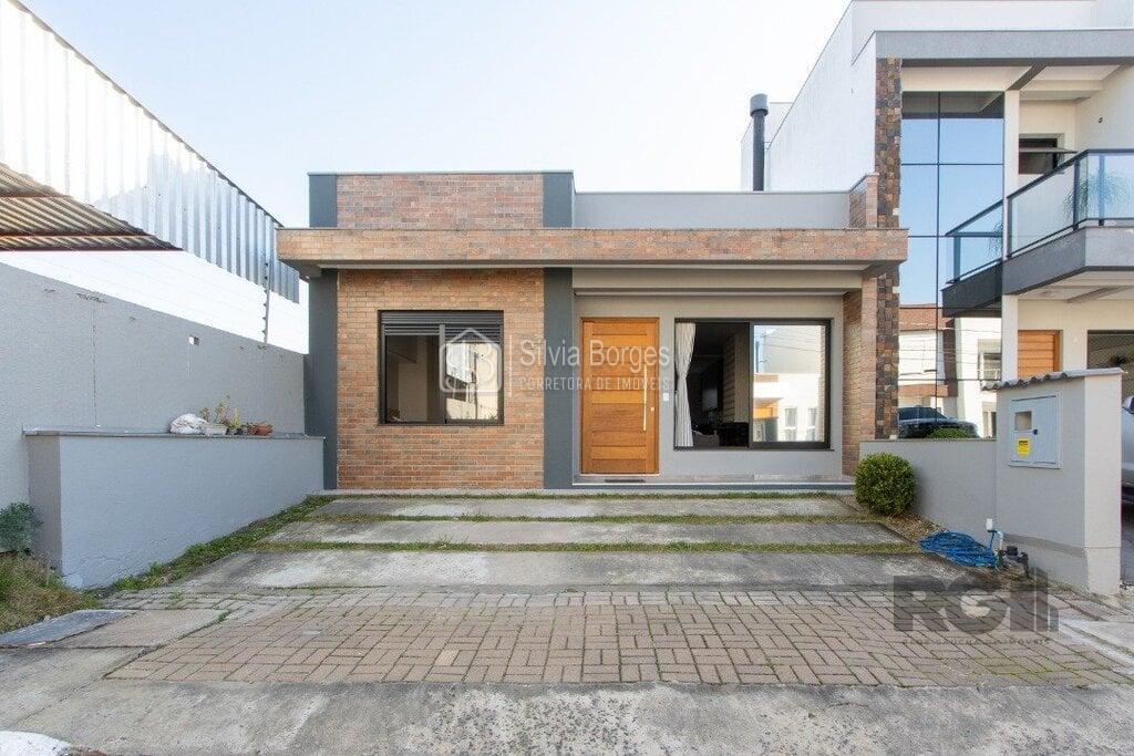 Casa à venda com 3 quartos, 112m² - Foto 1