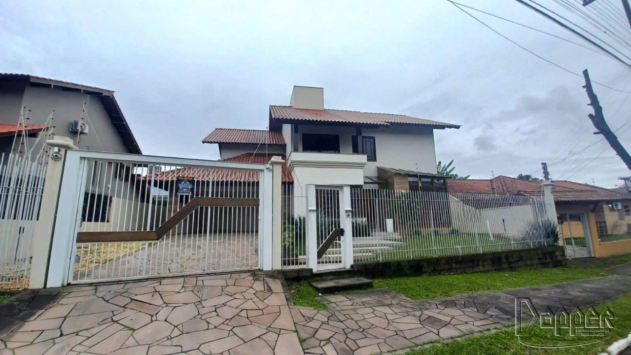 Casa para alugar com 4 quartos, 292m² - Foto 1