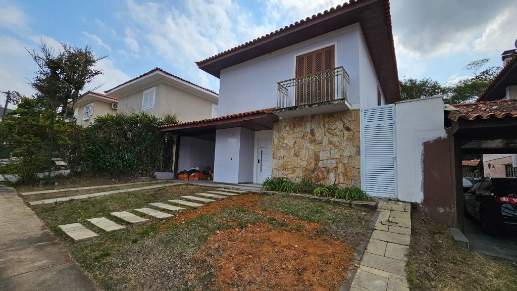 Casa de Condomínio à venda com 4 quartos, 270m² - Foto 1