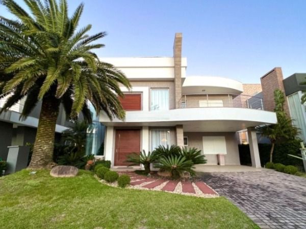 Casa de Condomínio à venda com 4 quartos, 381m² - Foto 1