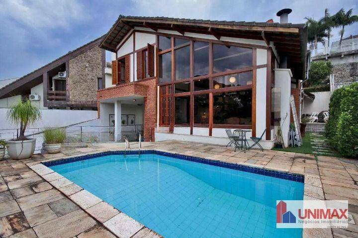 Casa de Condomínio à venda com 4 quartos, 450m² - Foto 1