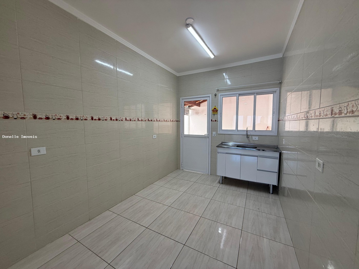 Casa para alugar com 2 quartos, 125m² - Foto 13