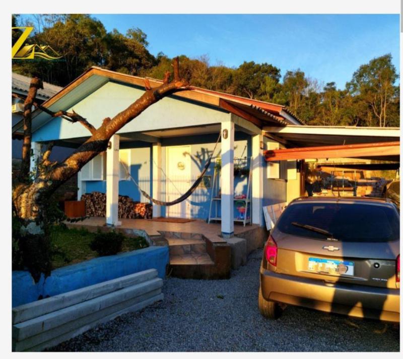 Casa à venda com 2 quartos, 70m² - Foto 1