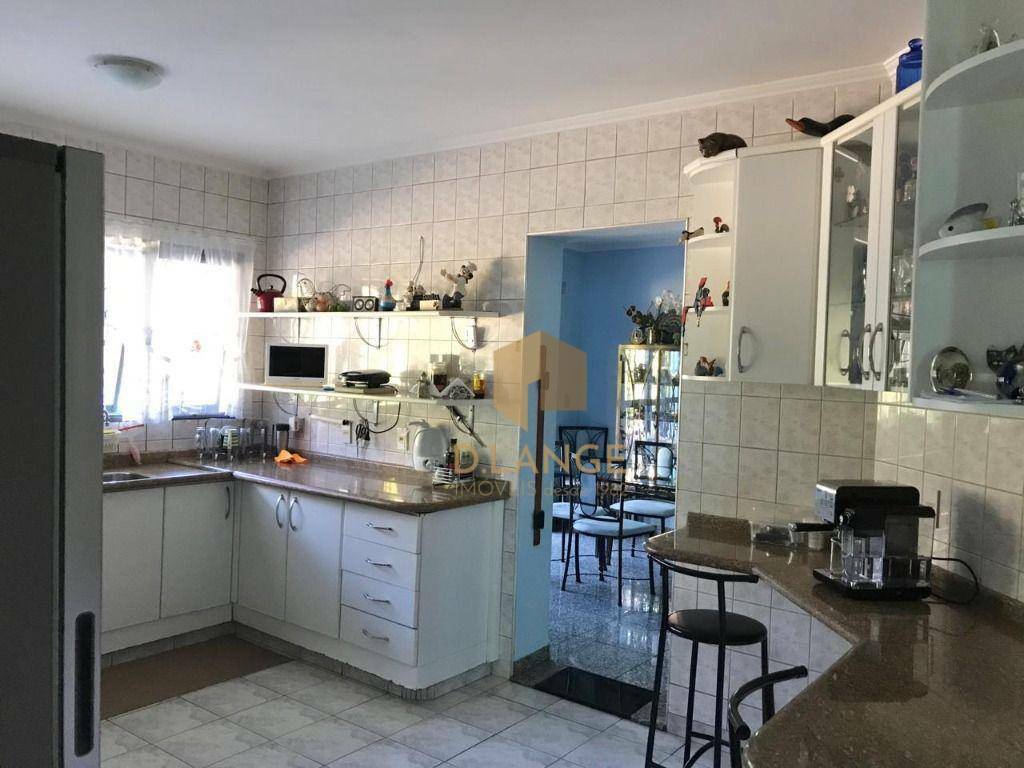 Casa à venda com 4 quartos, 338m² - Foto 7