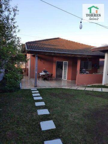 Casa à venda com 3 quartos, 100m² - Foto 1