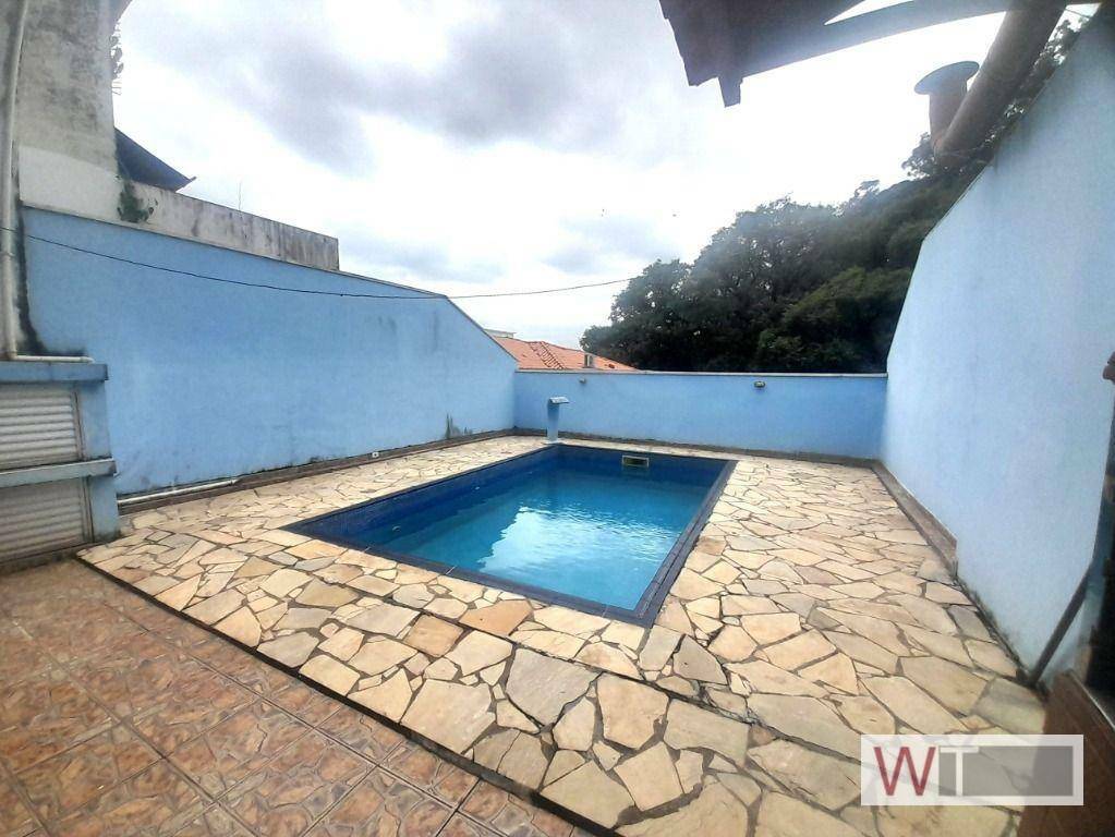 Casa à venda com 3 quartos, 100m² - Foto 1