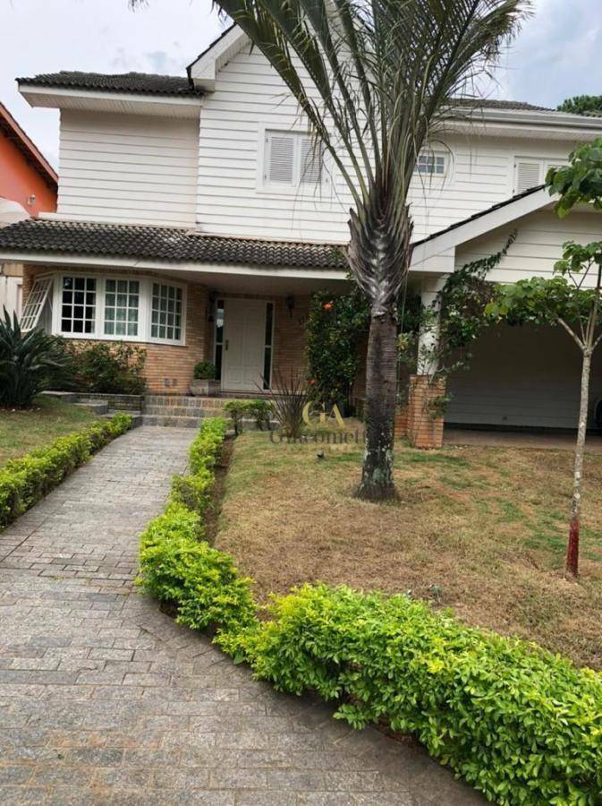 Casa de Condomínio à venda com 4 quartos, 385m² - Foto 1