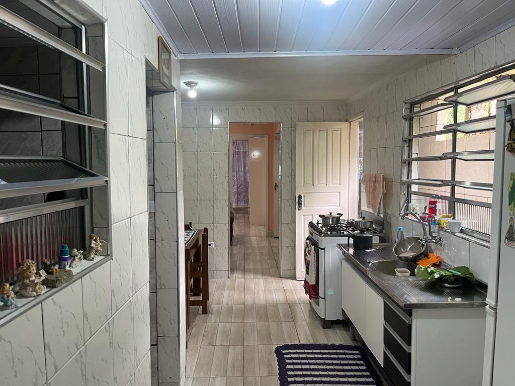 Casa à venda com 4 quartos, 150m² - Foto 14