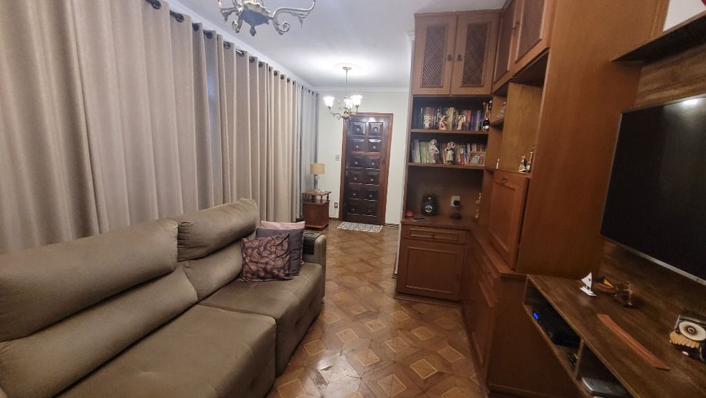 Casa à venda com 3 quartos, 118m² - Foto 1