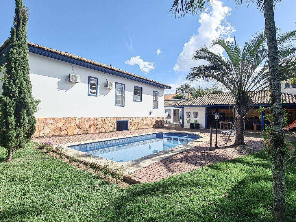 Casa de Condomínio à venda e aluguel com 4 quartos, 408m² - Foto 1