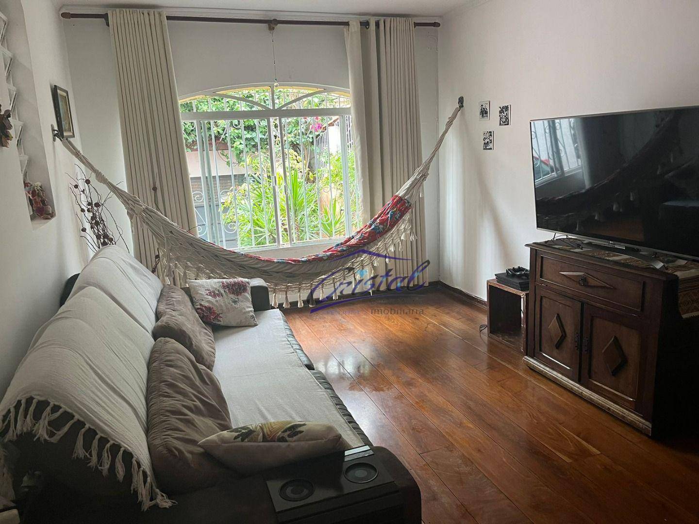 Casa à venda com 3 quartos, 179m² - Foto 1