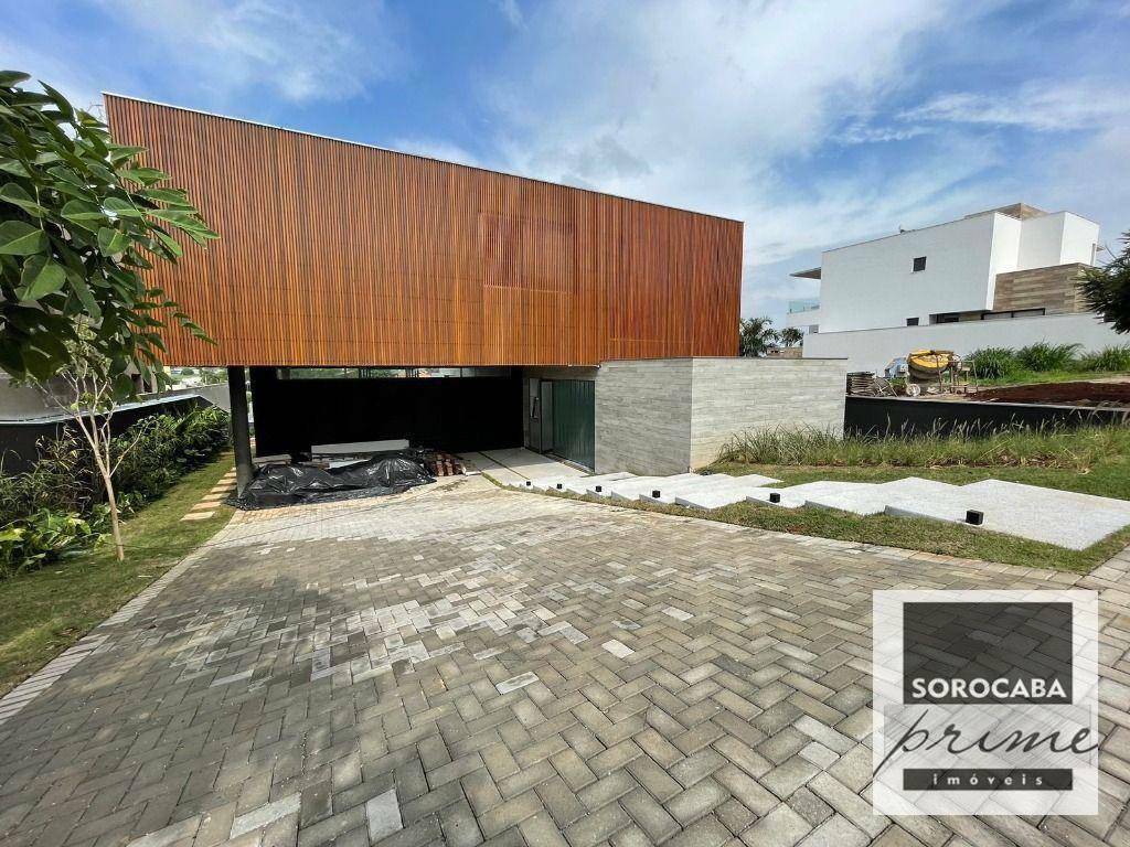 Casa de Condomínio à venda e aluguel com 4 quartos, 380m² - Foto 1