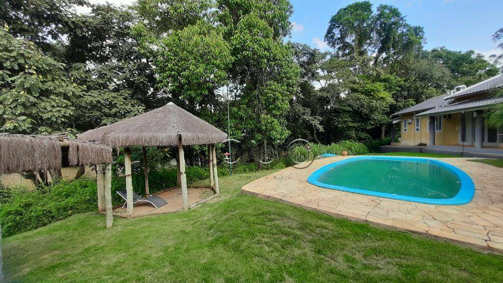 Casa de Condomínio à venda e aluguel com 3 quartos, 415m² - Foto 1