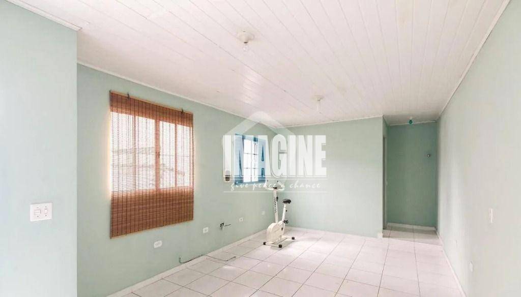 Casa à venda com 4 quartos, 157m² - Foto 2