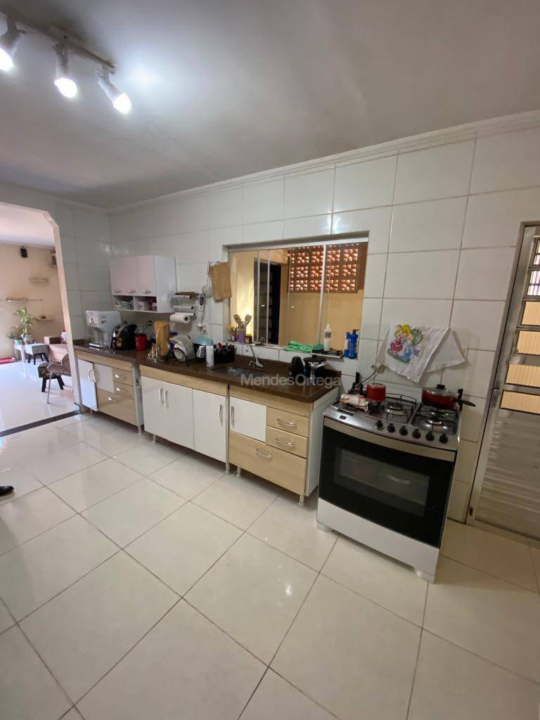 Casa à venda com 4 quartos, 218m² - Foto 5