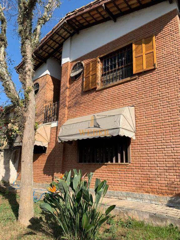 Casa à venda com 4 quartos, 254m² - Foto 1