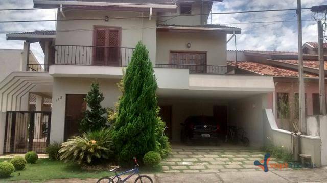 Casa de Condomínio à venda com 4 quartos, 357m² - Foto 1