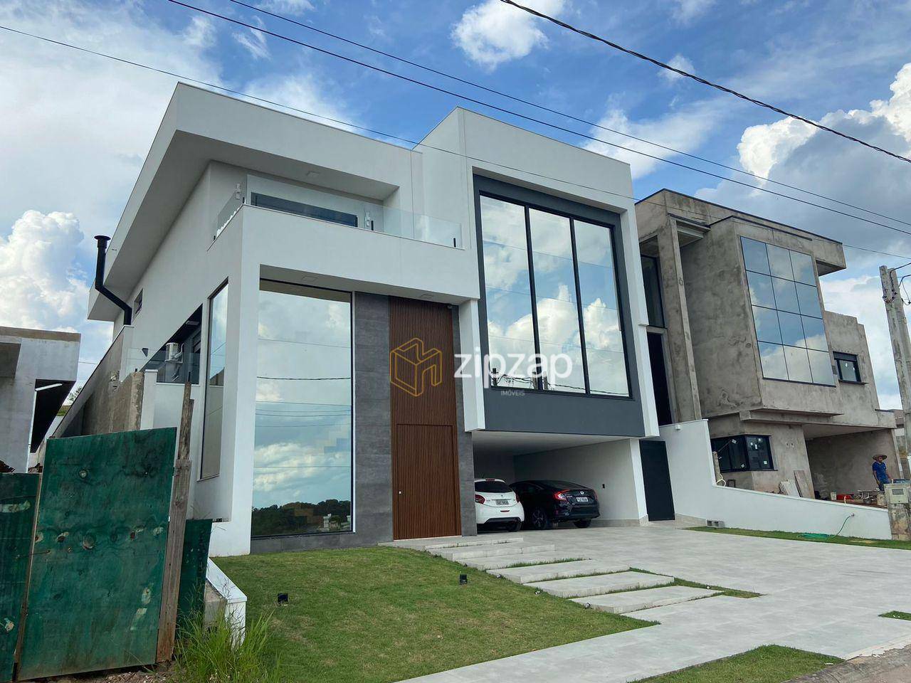 Casa de Condomínio à venda com 4 quartos, 414m² - Foto 1