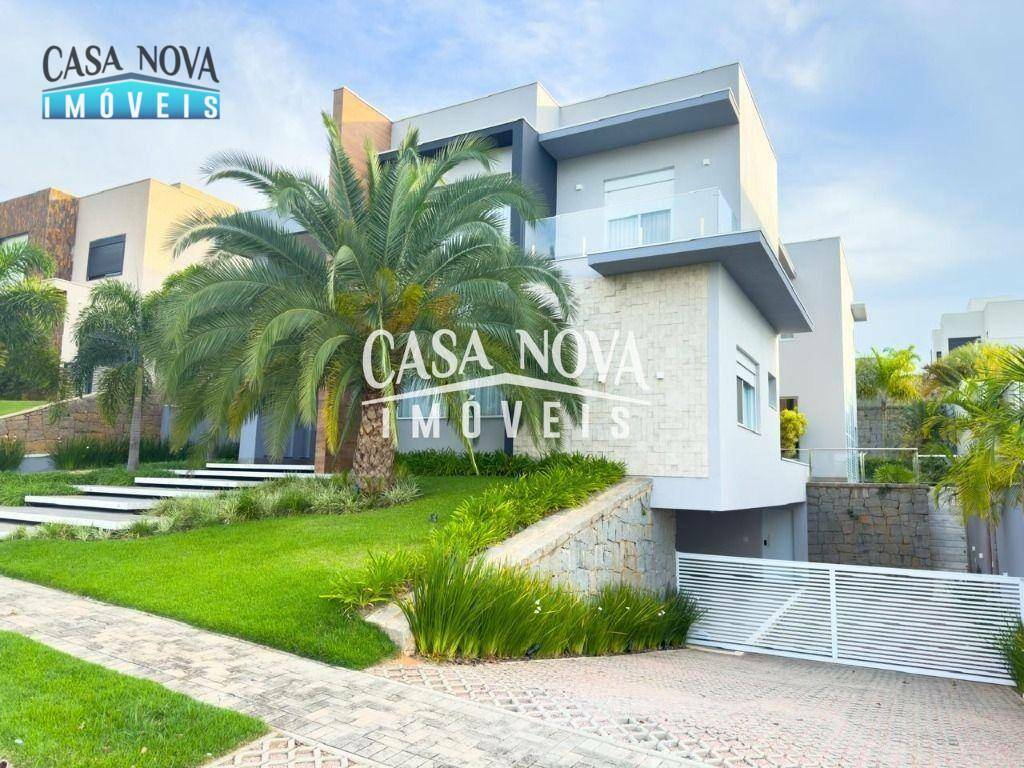 Casa de Condomínio à venda com 4 quartos, 560m² - Foto 1