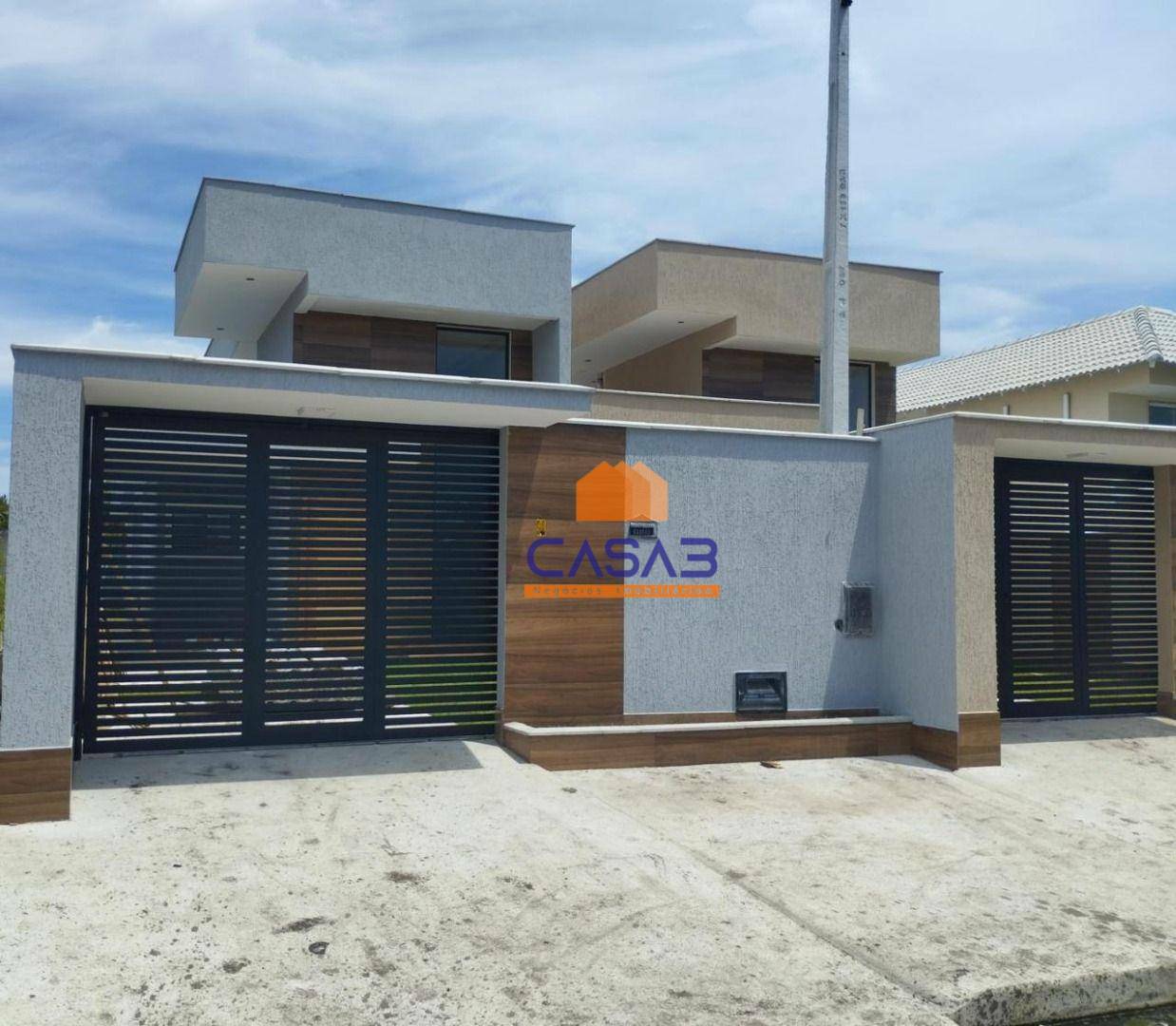 Casa à venda com 3 quartos, 100m² - Foto 1