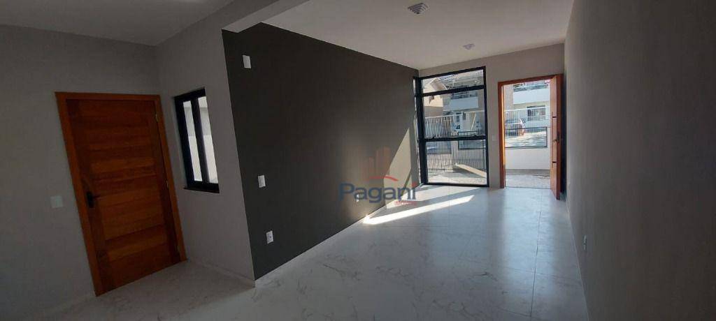 Casa à venda com 3 quartos, 70m² - Foto 9