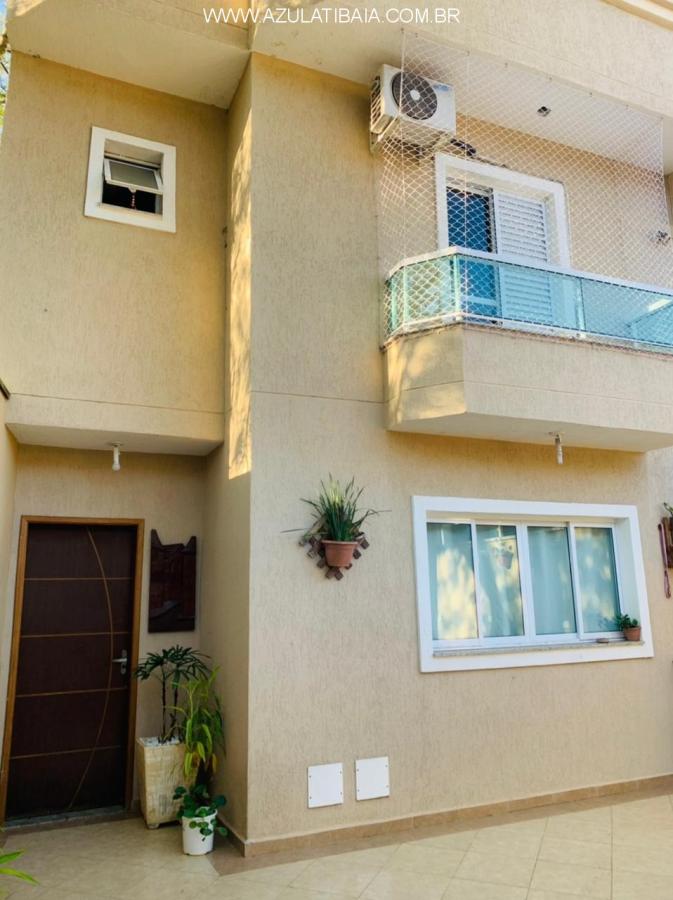Casa à venda com 3 quartos, 124m² - Foto 1