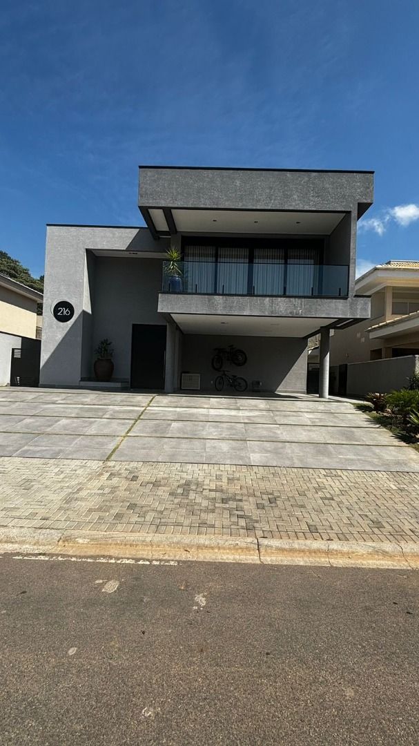 Casa de Condomínio à venda com 4 quartos, 459m² - Foto 1