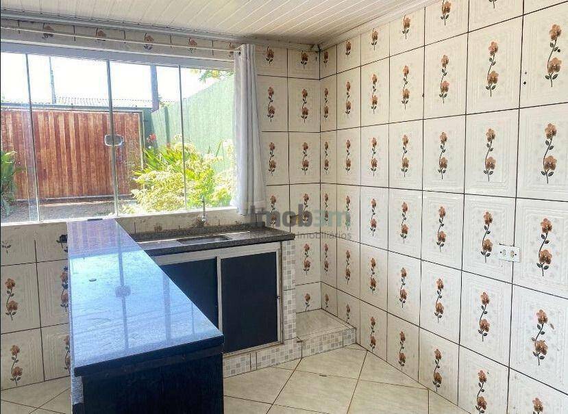 Casa à venda com 3 quartos, 100m² - Foto 4