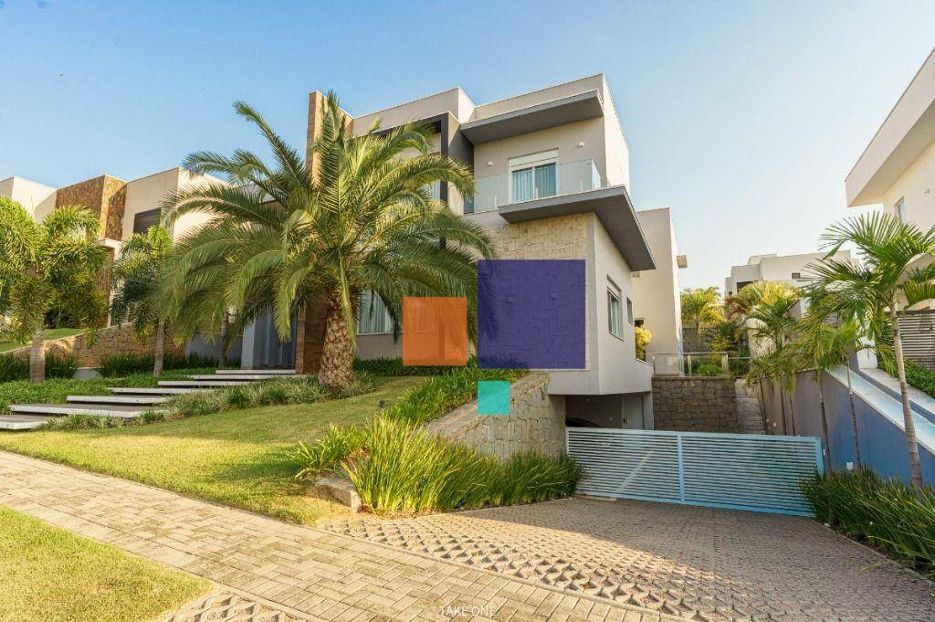 Casa de Condomínio à venda com 4 quartos, 560m² - Foto 1