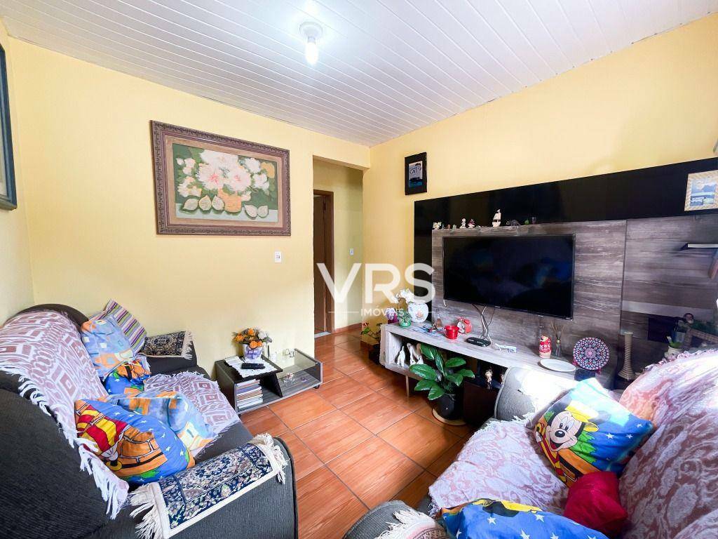 Casa à venda com 3 quartos, 60m² - Foto 1