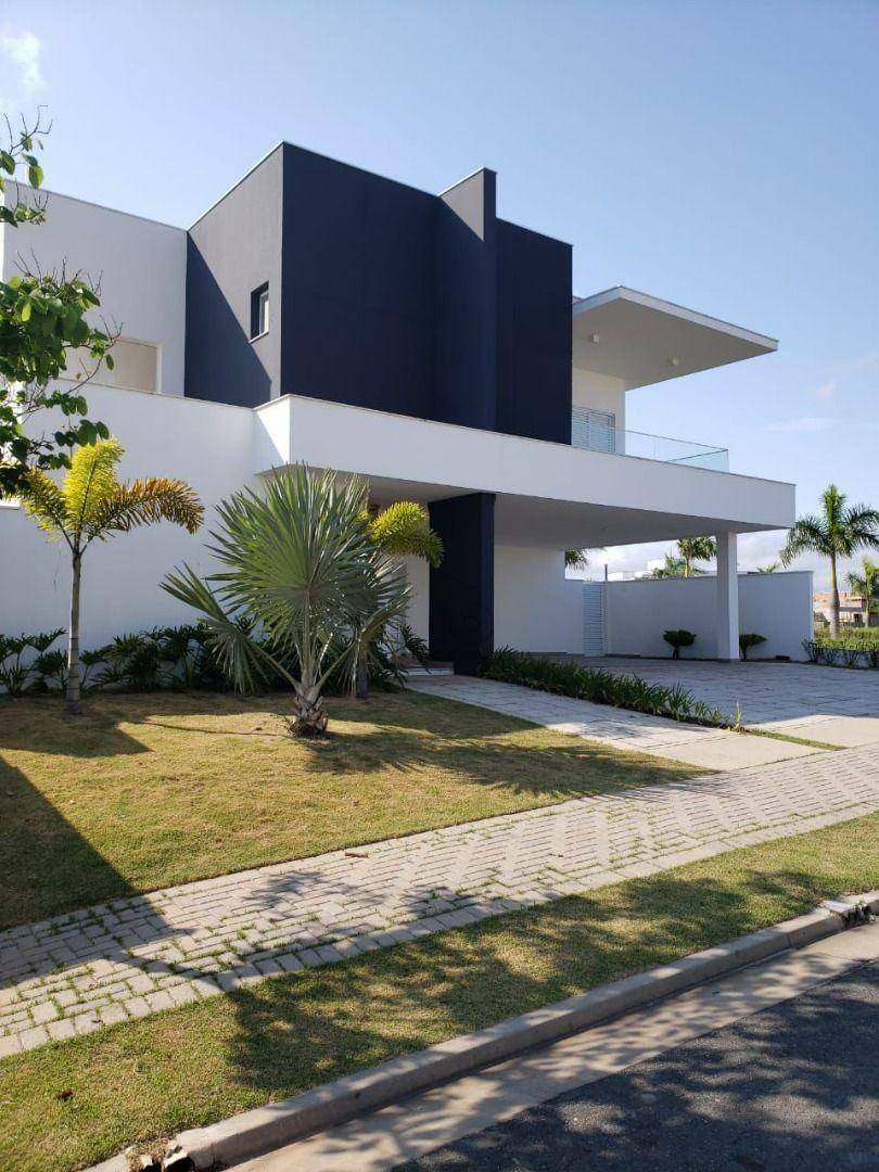 Casa de Condomínio para alugar com 5 quartos, 460m² - Foto 1