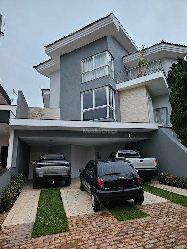 Casa de Condomínio à venda com 4 quartos, 419m² - Foto 1