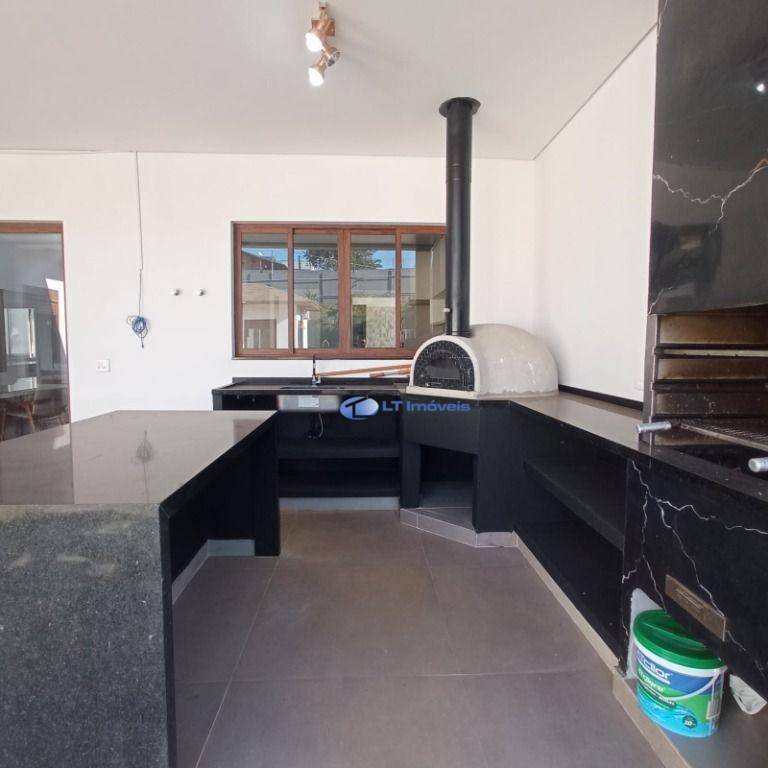 Casa de Condomínio para alugar com 4 quartos, 300m² - Foto 63