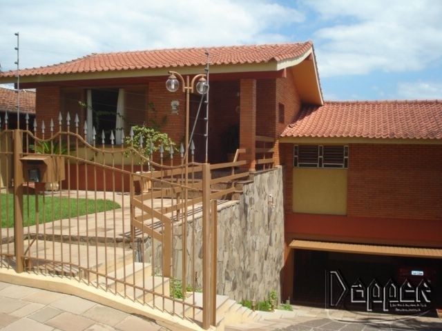 Casa à venda com 3 quartos, 409m² - Foto 1