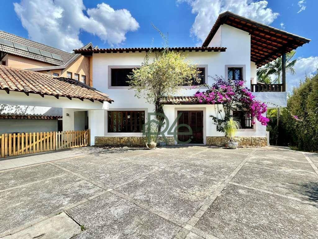 Casa de Condomínio à venda com 4 quartos, 372m² - Foto 1