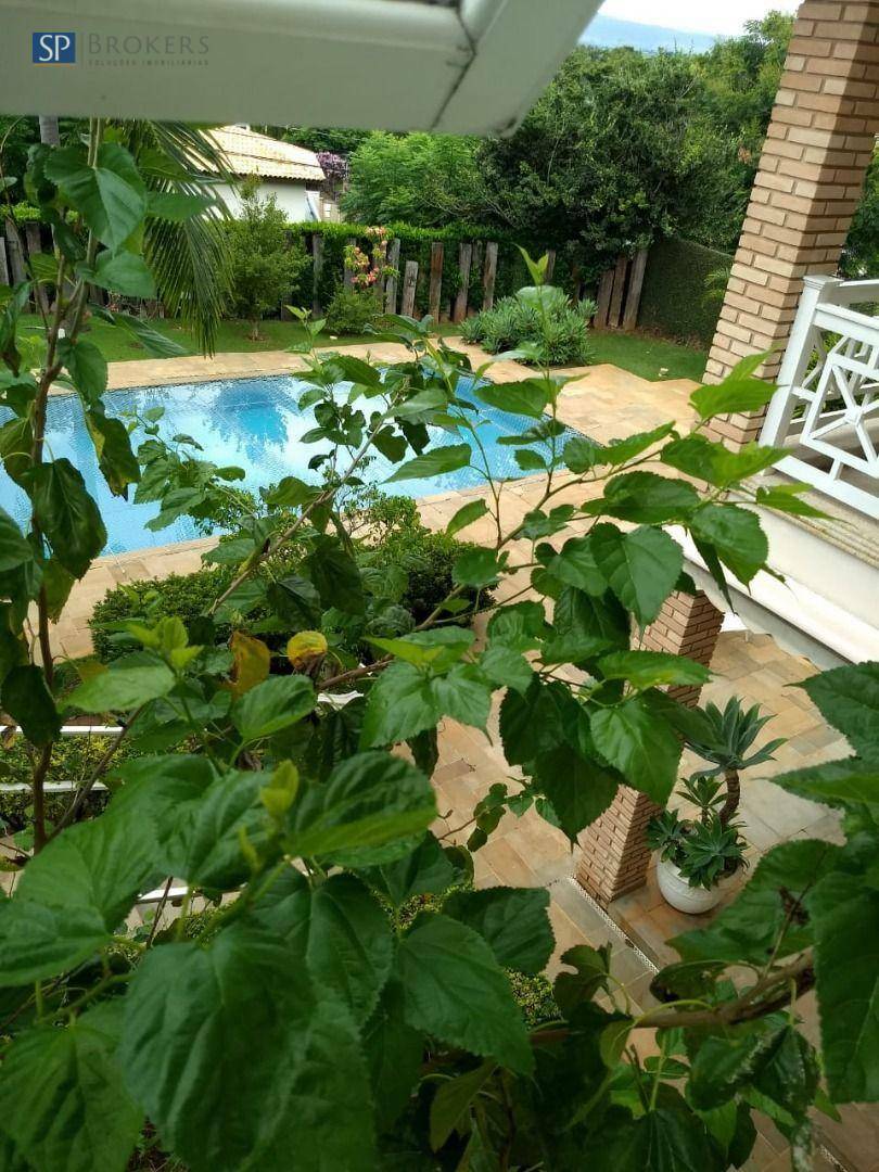 Casa de Condomínio à venda com 4 quartos, 562m² - Foto 1
